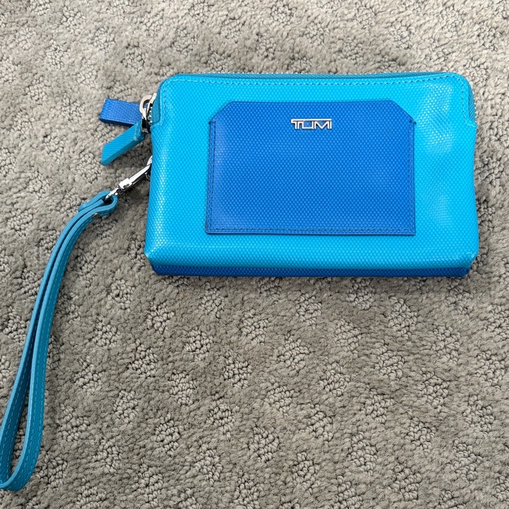 TUMI Vibrant Blue Wristlet with Silver Accents